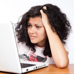 girl-looking-at-laptop